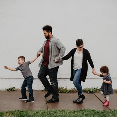 A family holding hands